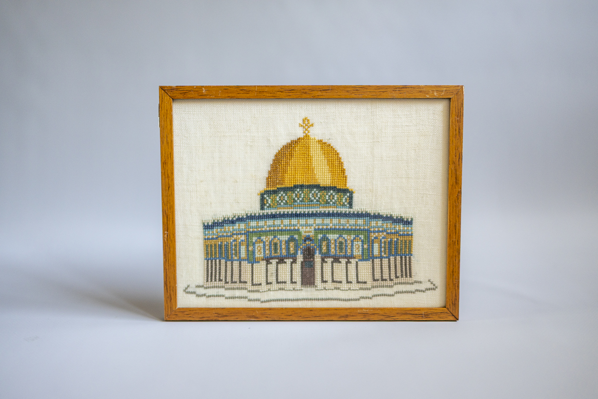 Small framed embroidery with architectural motif for textile reuse design
