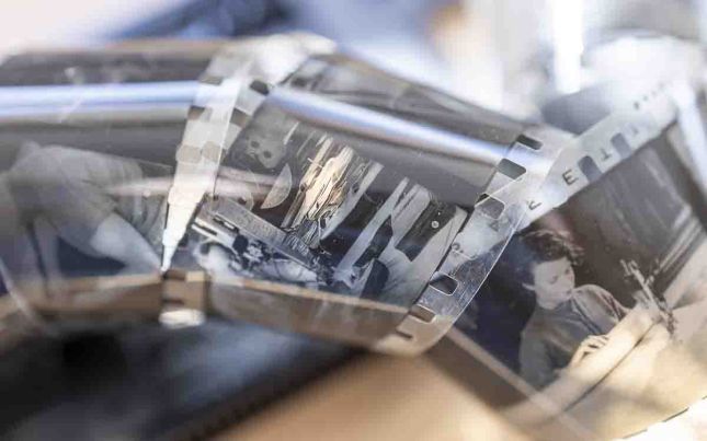 Research stage with archival fragments transformed into sustainable wall art