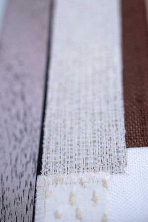 Bonded textile strips on  textile wall objects