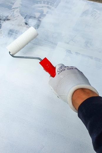 Studio view of Elena Kamphuis combining tactile and digital techniques for sustainable wall art