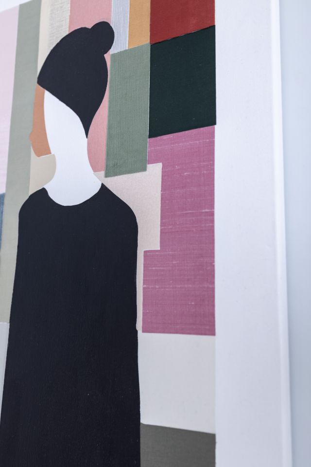 a circular wall panel made of reclaimed materials